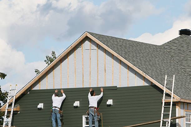 Professional Emergency Siding Repair technician working in Milton, MA